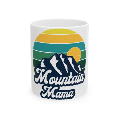 Mug with "Mountain Mama" text and stylized mountain and sun graphic.