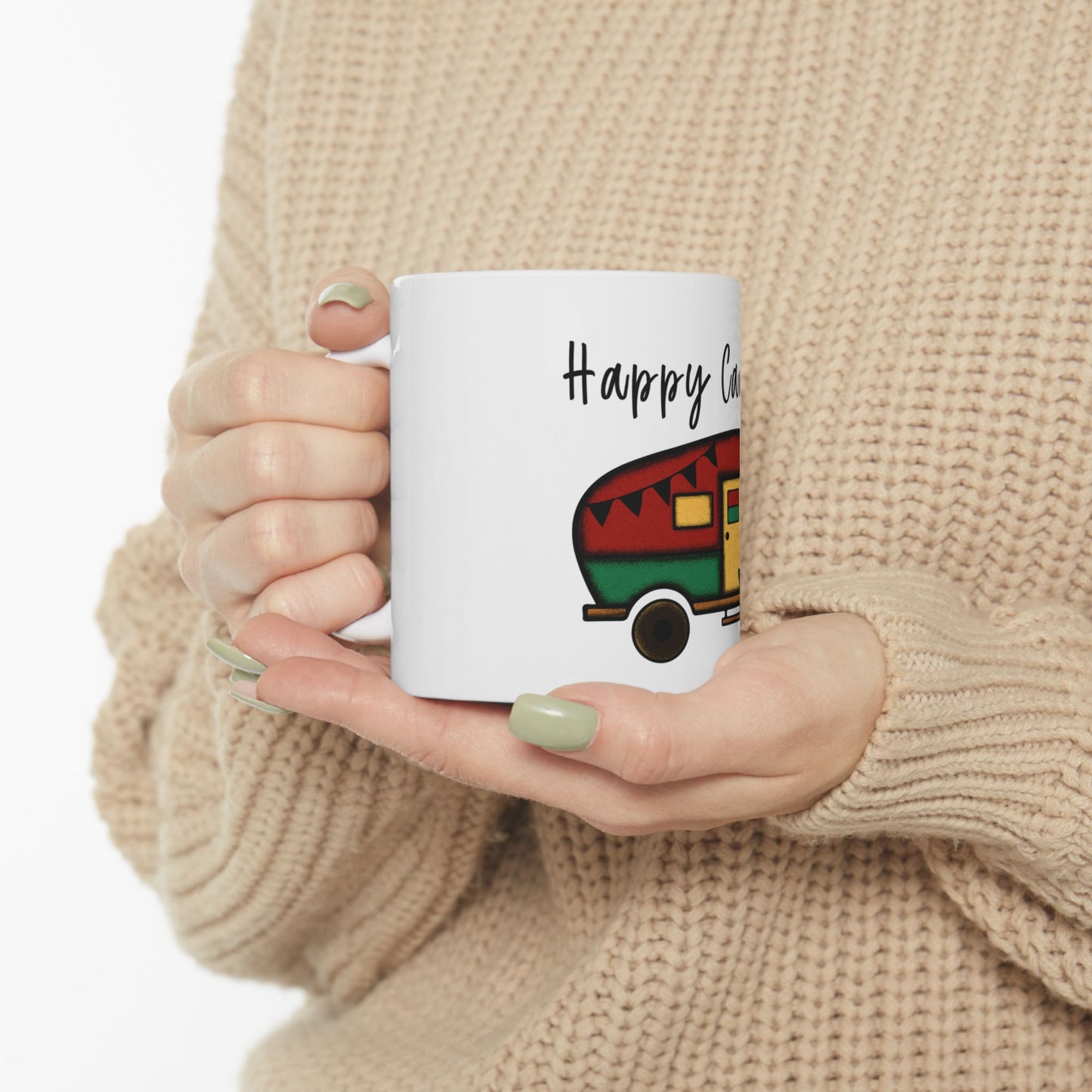 Mug with "Happy Camper" text and a colorful vintage camper illustration.