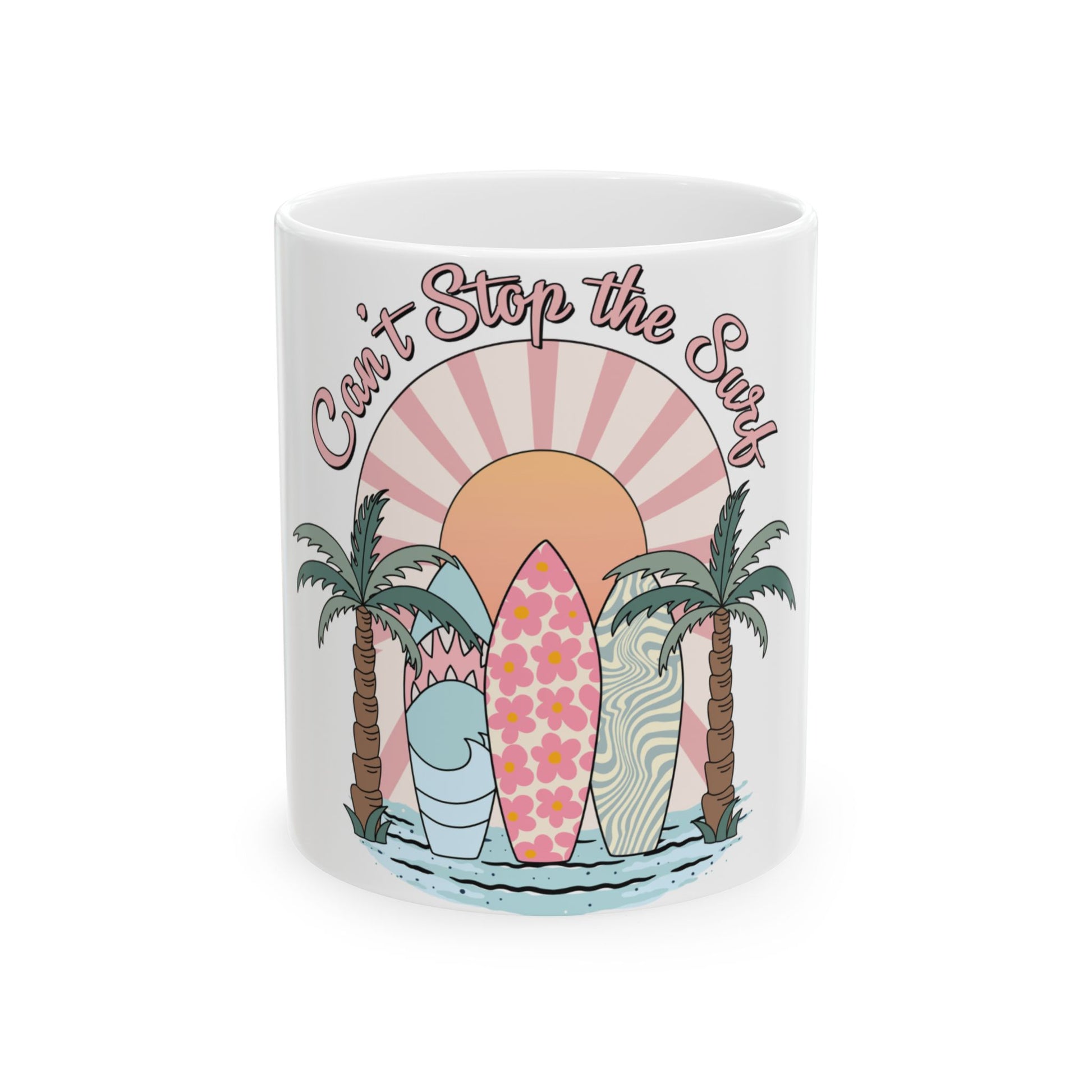 Mug with "Can't Stop the Surf" text, surfboards, palm trees, and a sunset.