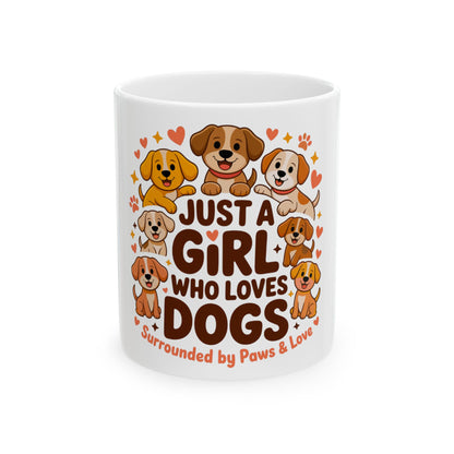 White mug with cartoon dogs and text "JUST A GIRL WHO LOVES DOGS Surrounded by Paws & Love".