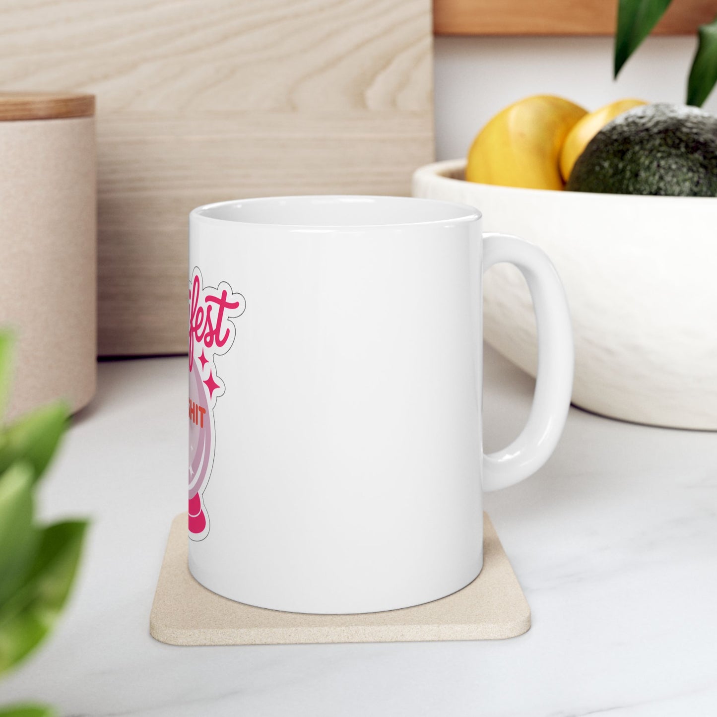 White mug with "Magic Fest" and glitter ball design on a coaster.