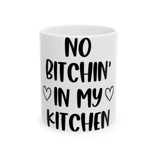White mug with black text "NO BITCHIN' IN MY KITCHEN" and heart symbols.