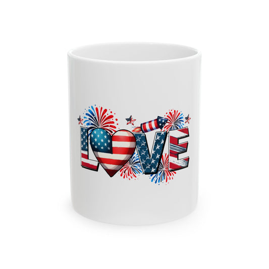 White mug with "LOVE" in patriotic USA flag design and fireworks.