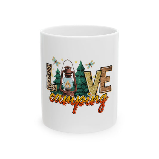 White mug with "LOVE camping" text, lantern, and dragonflies.