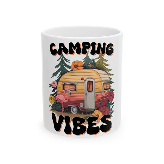 Retro camper with flamingo and flowers, "Camping Vibes" text.